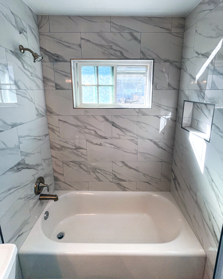 Lemon Grove Bathroom Remodel with White Marble Tub Surround and New Fixtures